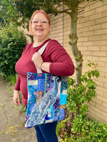 Participant Luna with the boro bag she made